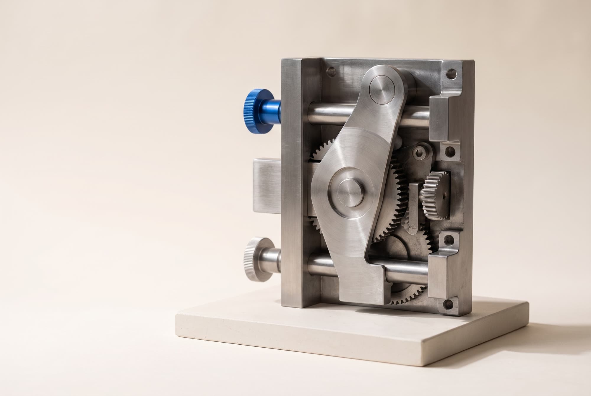 A machined steel vault-door locking mechanism with one cobalt bolt head, on a stone plinth
